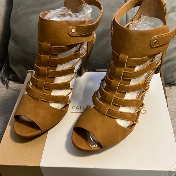 Brand new dark tan sandals. Never worn. Brand new. - Picture 1 of 4